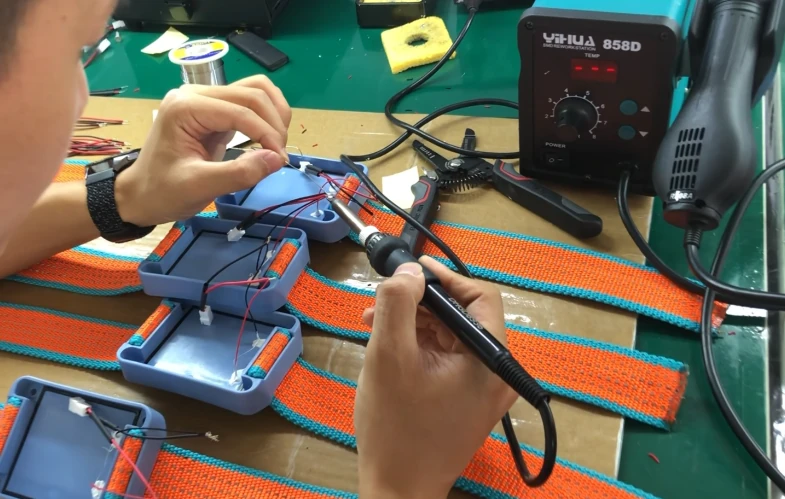 Livestock device assembly at a workbench